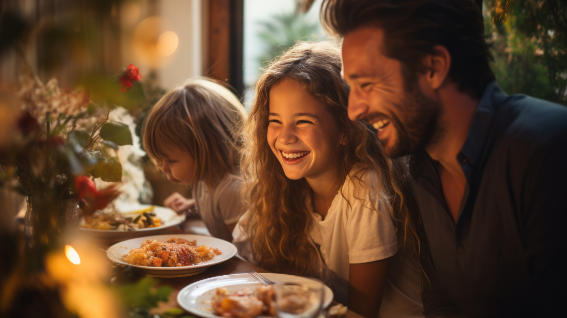 Happy family eating dinner