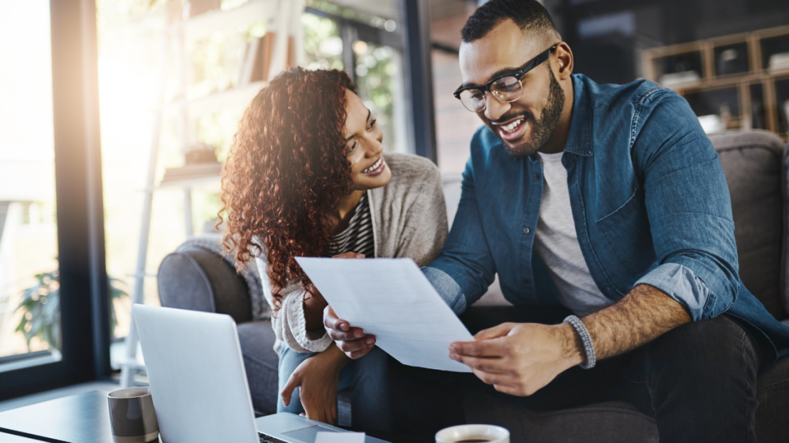 Happy family reading letter